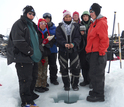 Iñupiat students sampling water on the frozen Kaktovik Lagoon, Alaska.